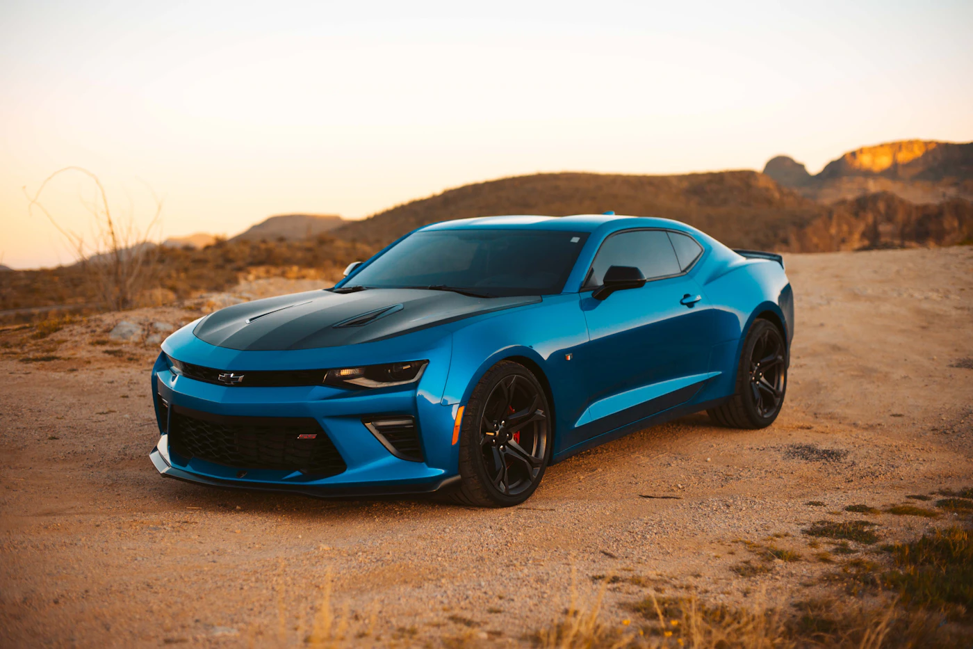 Blue sports car with glossy paint in outdoor light