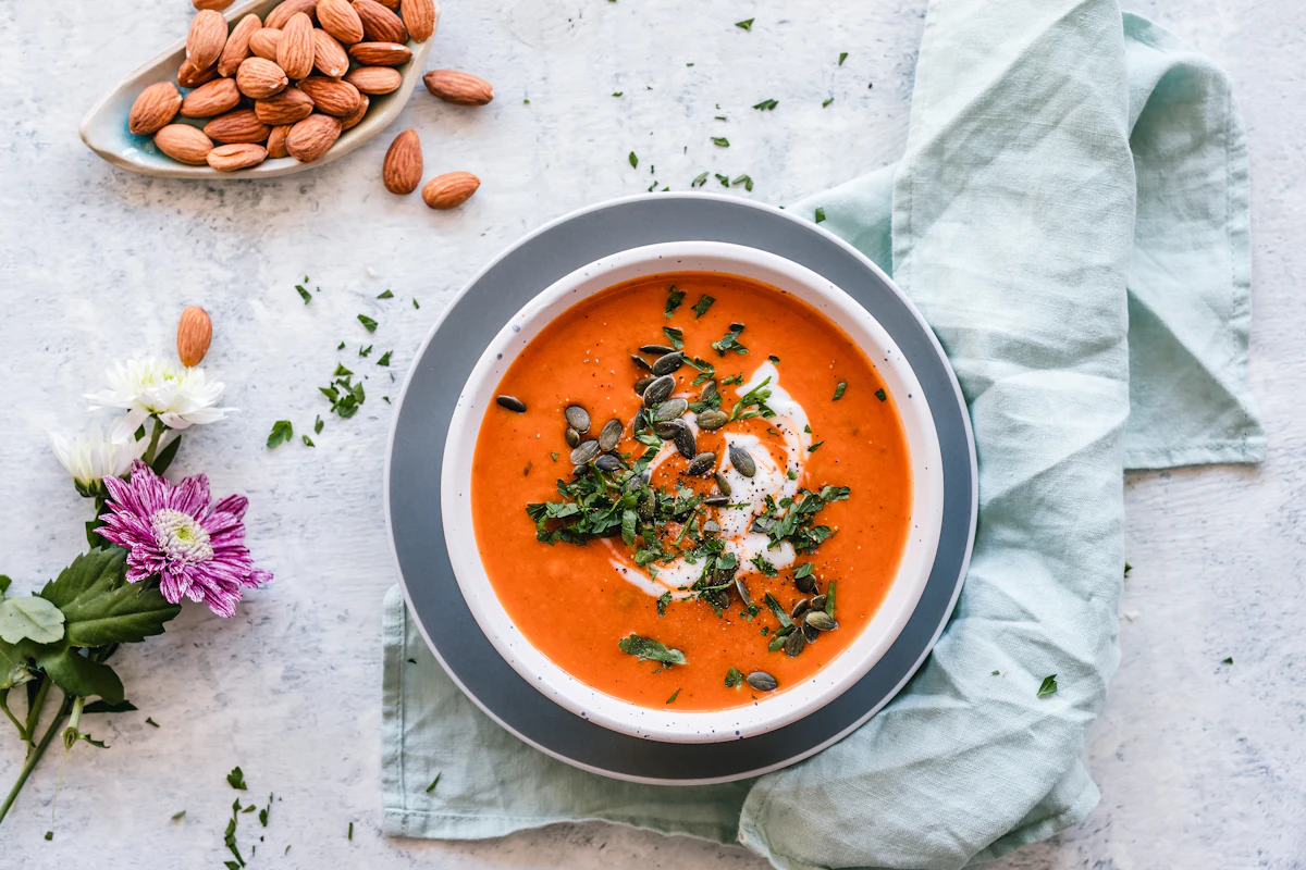 Warm bowl of soup with herbs